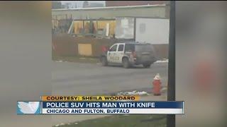 Buffalo police SUV hits man with knife