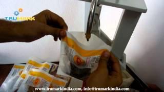 Hand operated paste filler machine , filling paste in pouch bags