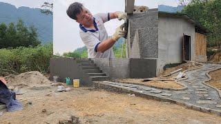 Plastering the walls around the balcony.