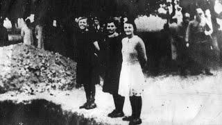 Execution of partisan teenage girls by firing squad smiling proudly at executioners before shot