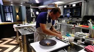 Chef Jan Sobecki prepares a vegetarian beet dish in restaurant Tribeca, Heeze, The Netherlands