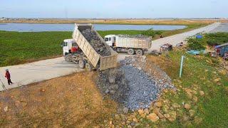 SHANTUI in Action: Clearing Rock and Dirt from Lake with Dump Truck Unloading