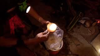 A local on Koh Muk Island makes the very popular drink "Nam Khatong" that everyone drinks here.
