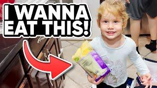 Toddler's Funny Reactions While Unpacking Groceries With Dad