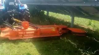 Perfect rotary mower with swing arm mowing underneath solar panels