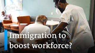 Germany: New green card system to tackle shortage of skilled workers | DW News