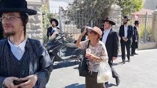 Grandmother of wounded soldier confronts protesters