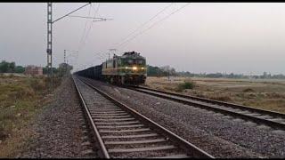 Coal boggies Frieght train running fast with WAG-9HC green dragon locomotive engine...