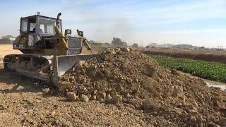 Stronger and Powerful Machines Bulldozer Pushing Dirt Vs Dump Truck Unloading Dirt