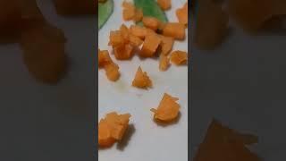 feeding carrots to my Oscar fish! home made fish food !  Aycan