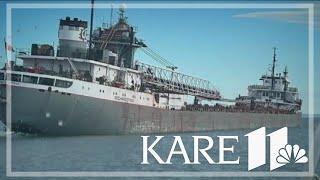 Ship carrying taconite docks after taking on water on Lake Superior