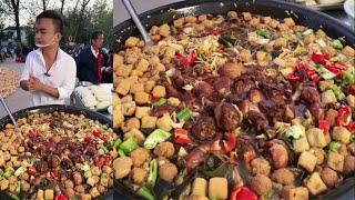 A Chinese Man Cook Free Meals / Noodles Meat Food for the old on the Street in the Countryside