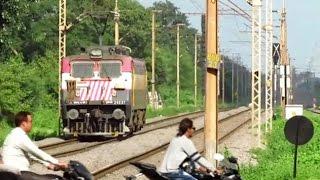 LOTS OF DRAMA: Pooja Chants+Light Locomotive+Vehicles At A Railway Crossing