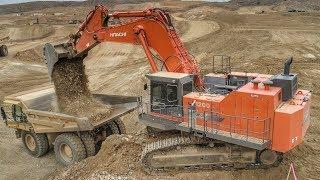 Hitachi EX1200 Loading Cat 777 trucks