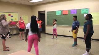 Improv arts enrichment class at YA summer learning site