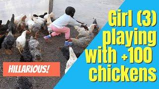 Girl playing with cickens, over 100 kuroiler free range chickens and names one of them