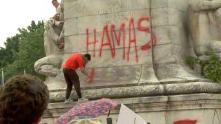 Protester sprays 'Hamas is comin' on Christopher Columbus statue in Washington, D.C.