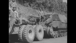 Ward LaFrance M1A1 and M26 towing a knocked out Elefant tank destroyer near Rome in June 1944