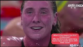 Why do American swimming teams have purple faces after their races?