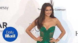 Irina Shayk wears unusual beaded green gown to amfAR gala - Daily Mail