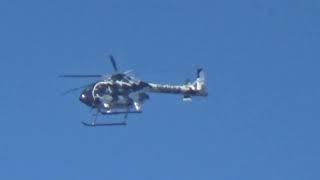 MD Helicopters MD 600N N641LB flying past Great Hollands on 4 March 2025