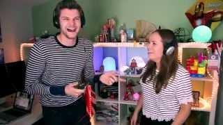 Jim Chapman laughts at Tanya Burr's concentrating face