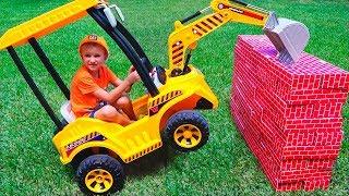 Tractor breaks down the walls - Vlad ride on power wheel to help kid