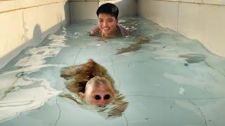 Athlete Swimmer Luk swimming with Thang in garden pool so funny