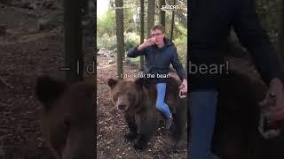 A Russian drinks vodka riding a bear #shorts