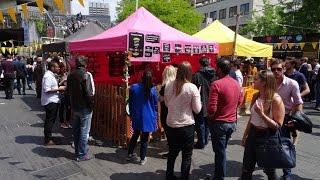 Walking amongst the Indian and Pakistan Street Food stalls at Alchemy Festival, Southbank, London.