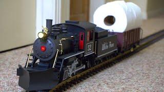 Using a model train to deliver toilet paper