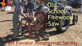 Old School Man Killer Tractor PTO driven saw in action!