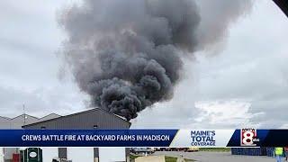 Crews battling fire at Backyard Farms in Maine