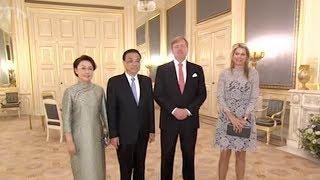 Chinese Premier Li Keqiang and wife meet Dutch king and queen