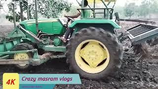 John Deere 5050D||with front  dozer and palau working on farmer