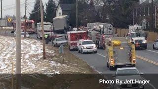 2 rescued after commercial vehicle crashes into Upperco house