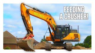 Excavators feeding a crusher! | DIGGERS AND DOZERS