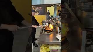 Uyghur lagman cooking.