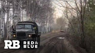 Report: Analysts say Russian military buildup likely intended as a warning to the West