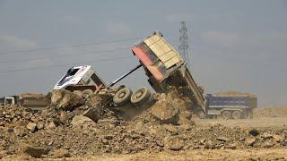 Incredible Dump Truck unloading accident overturned recovery by wheel loader and Excavator