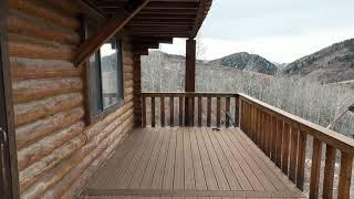 Charming Cabin with a Deckorators Deck Built By Ogden Decks