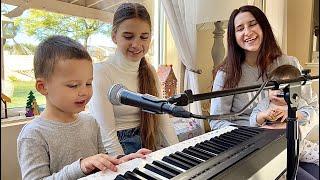 3-year-old Leo Protsenko is playing piano and singing