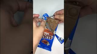 Unboxing m&m’s crispy bar#chocolate #chocolateasmr #satisfying #shorts