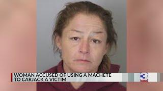 Woman carjacks man with machete, leaving people in shock