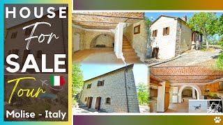 Ancient renovated country stone farmhouse move in ready in with fenced garden for sale in Italy