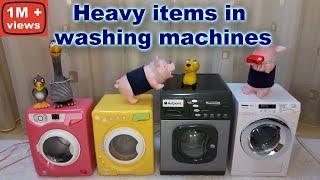  Heavy items in washing machines by HAPPY PIGS (toy washing machines modified)