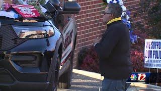 Residents, city leaders visit growing memorial for fallen Greensboro police officer