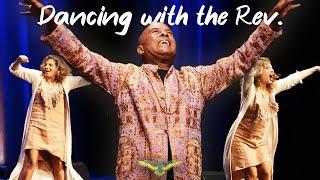 Dancing with the Rev.⎮Michael Beckwith & Parashakti share a dancing moment at Agape Spiritual Center