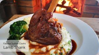 Lamb Shank with buttery, fluffy mashed potatoes, veggies and silky smooth gravy.