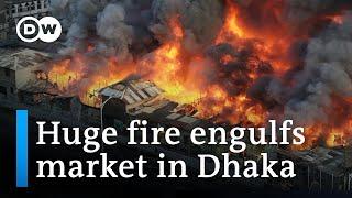 Firefighters tackle blaze in Dhaka clothing market | DW News